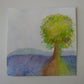 Painting of a tree with a blue landscape in the background