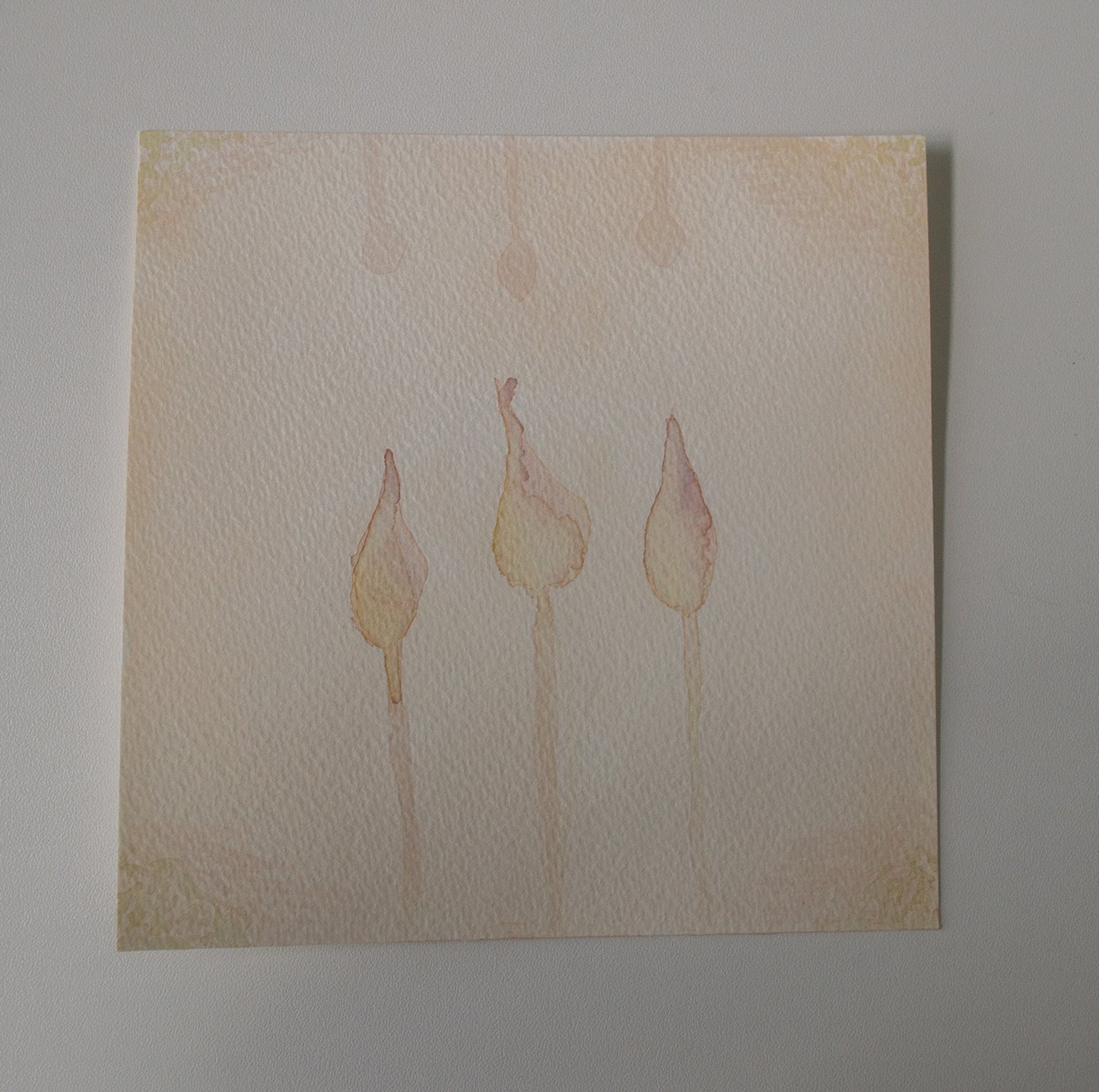 Artistic depiction of three abstract figures on textured beige paper.